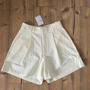 Cream shorts Danielle Bernstein WeWoreWhat